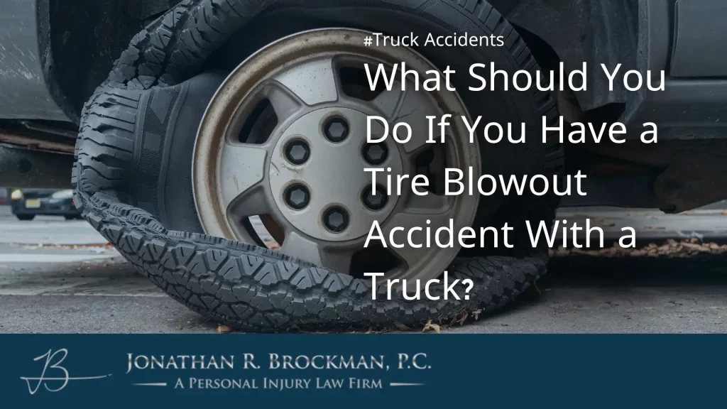 What should you do if you have a tire blowout accident with a truck