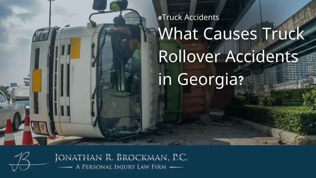 A truck rolled over on its side under a rail bridge, with superimposed words, what causes truck accidents in georgia?